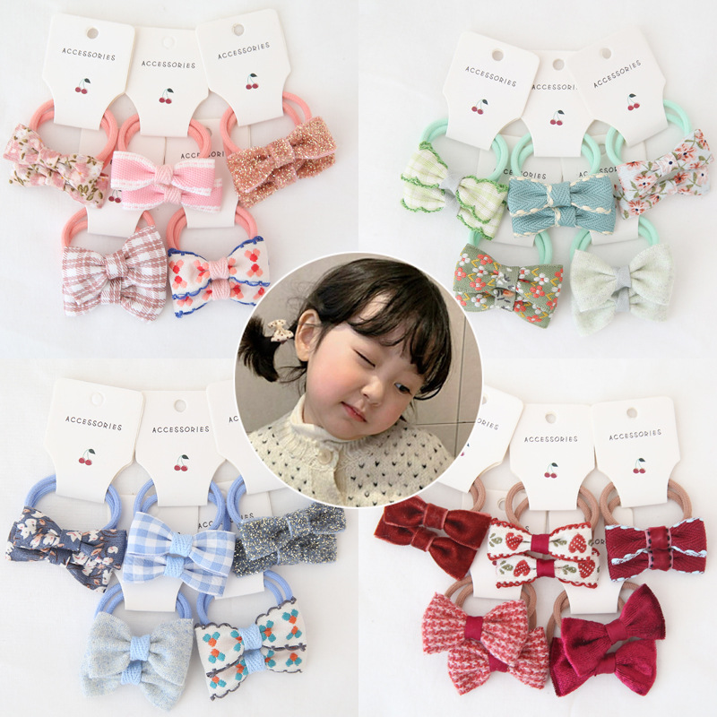 Child rubber band bow headwear a set