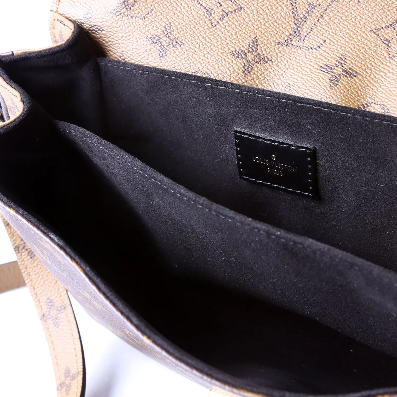 Pochette Metis Reverse Monogram