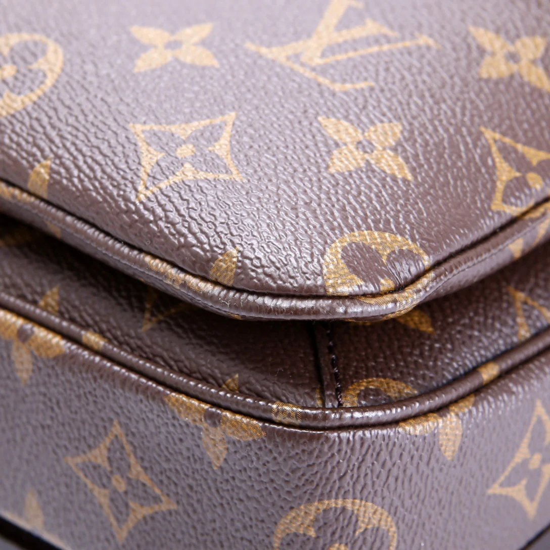 Pochette Metis Monogram