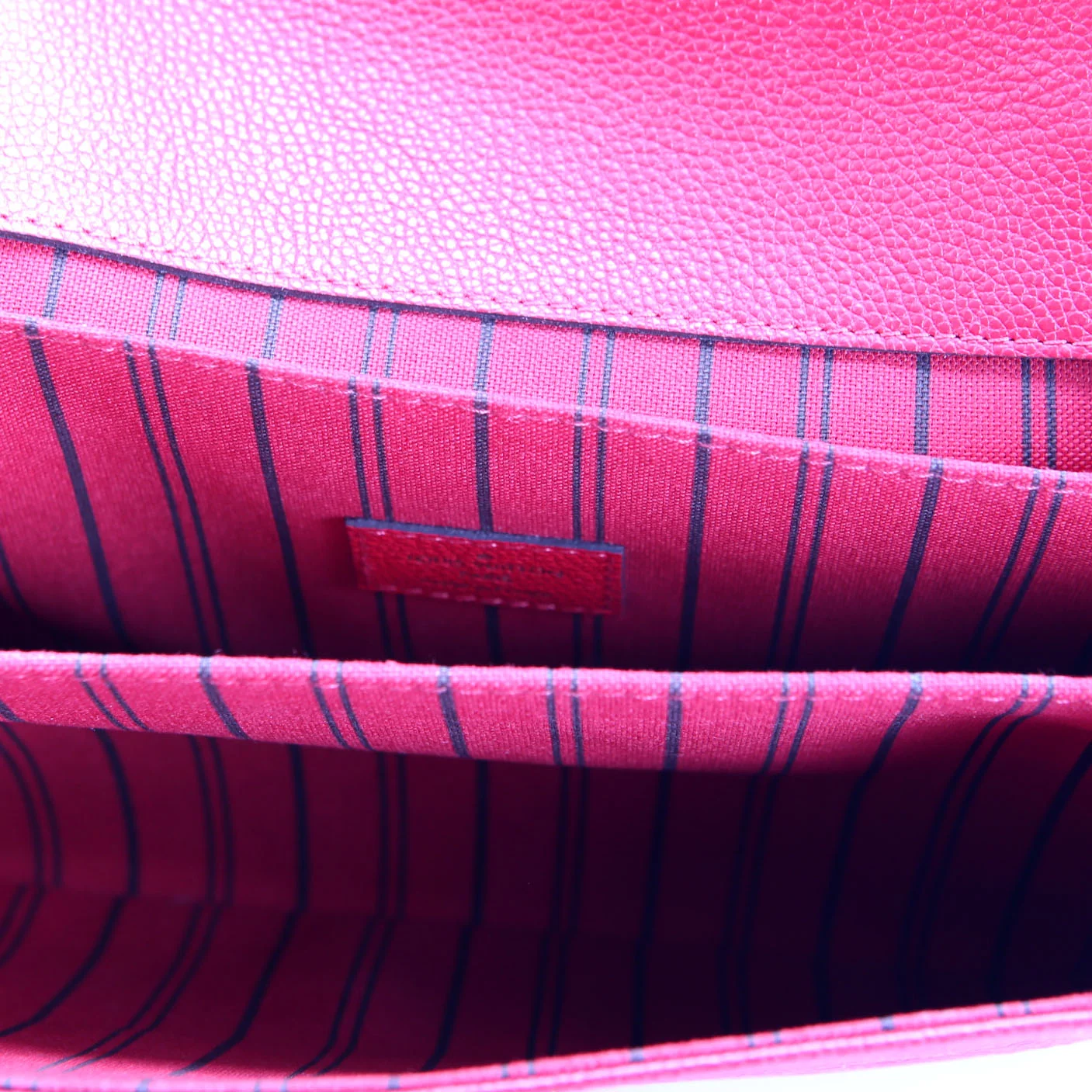 Pochette Metis Empreinte Red