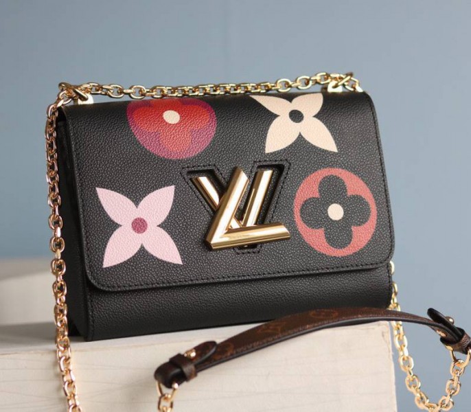 Louis Vuitton Monogram Empreinte Bold Printed Pattern Twist MM Bag In Black - Louis Vuitton