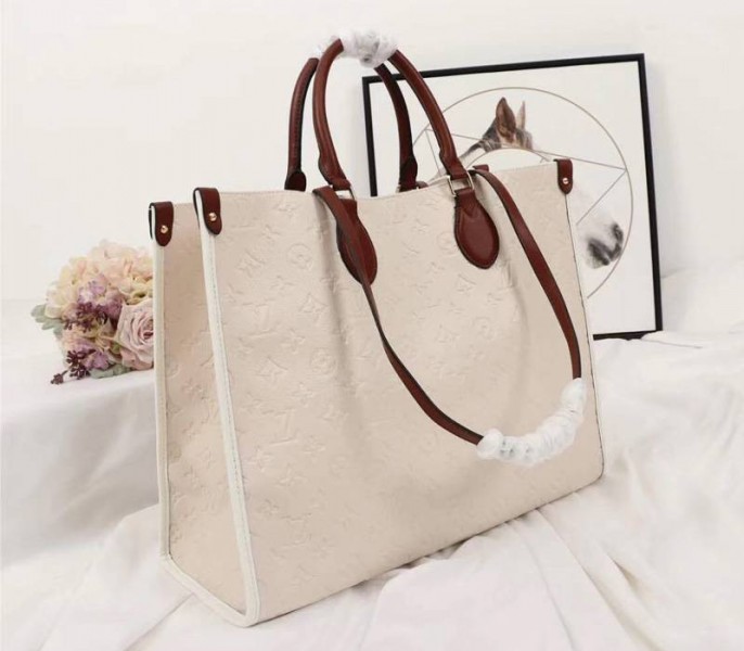 Louis Vuitton Monogram Empreinte Onthego GM Tote In Cream - Louis Vuitton