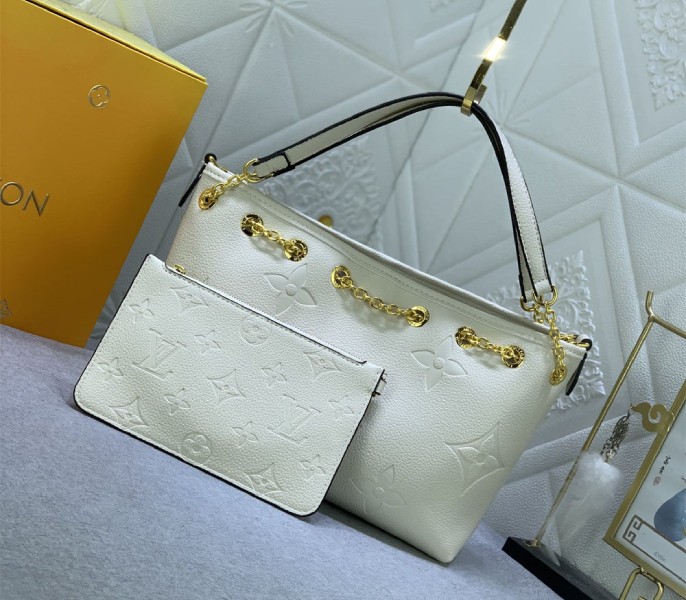 Louis Vuitton Monogram Empreinte Leather Bundle Bag In Cream - Louis Vuitton