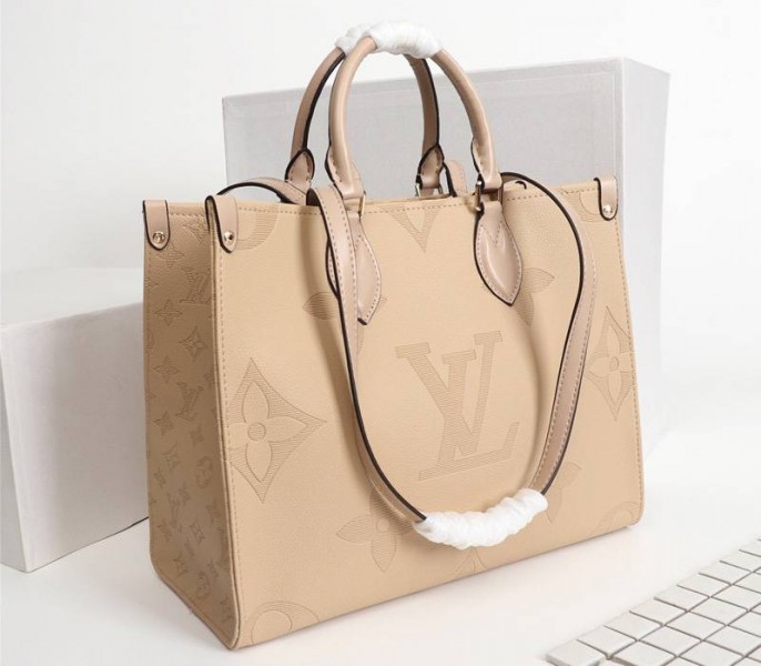 Louis Vuitton Monogram Empreinte Giant Onthego MM Bag In Beige - Louis Vuitton