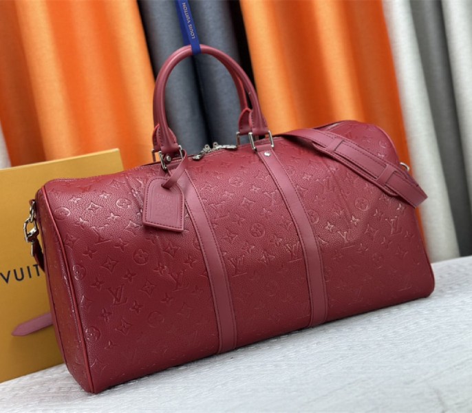 Louis Vuitton Taurillon Leather Keepall Bandouliere 50 In Sari Red - Louis Vuitton