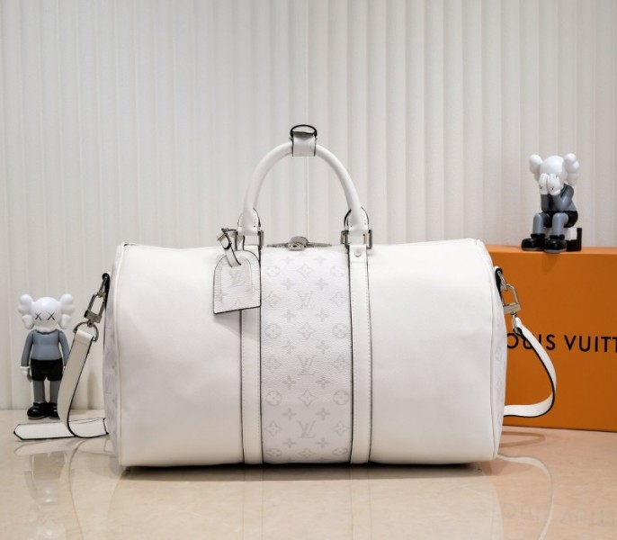Louis Vuitton Taiga Leather Keepall Bandouliere 50 Travel Bag In White - Louis Vuitton