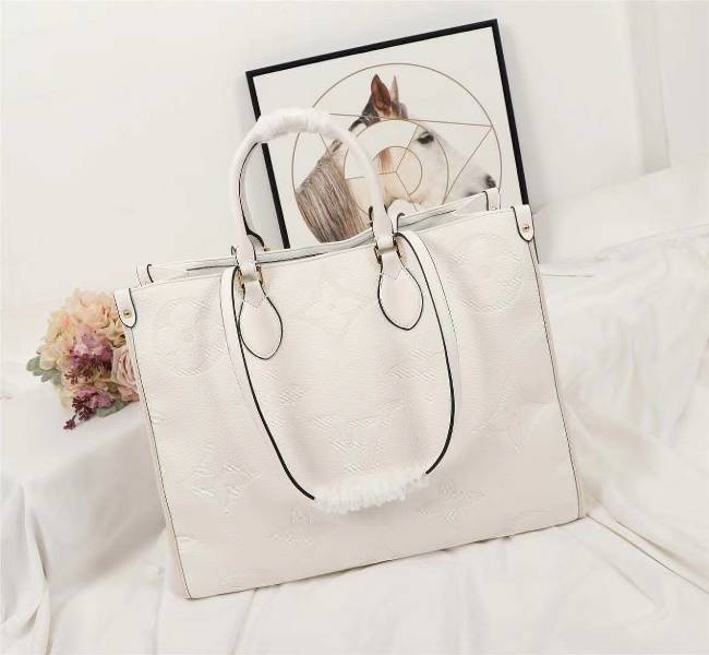Louis Vuitton Monogram Empreinte Giant Onthego GM Tote In Cream - Louis Vuitton