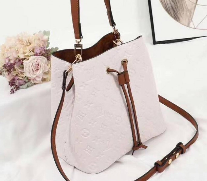 Louis Vuitton Monogram Empreinte NeoNoe MM Bag In Cream - Louis Vuitton
