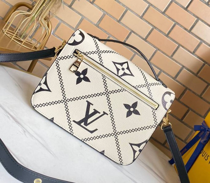 Louis Vuitton Spring 2022 Monogram Empreinte Pochette Metis Handbag In Cream - Louis Vuitton