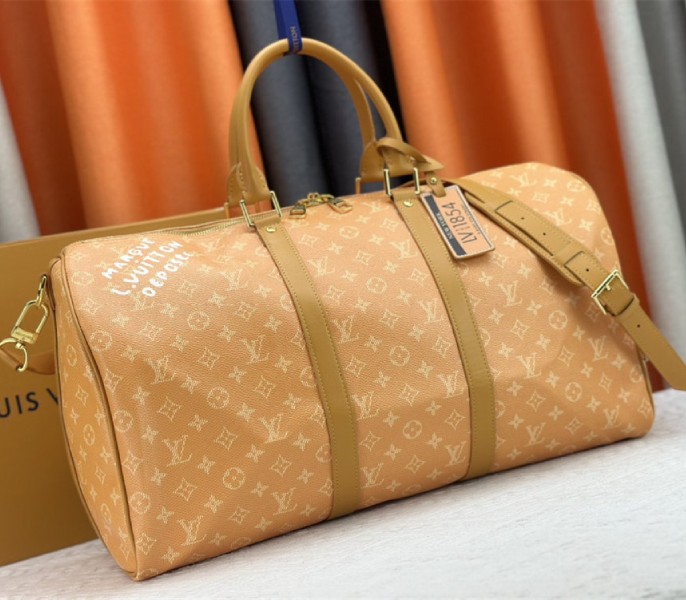 Louis Vuitton Monogram Heritage Canvas Keepall Bandouliere 50 In Yellow - Louis Vuitton