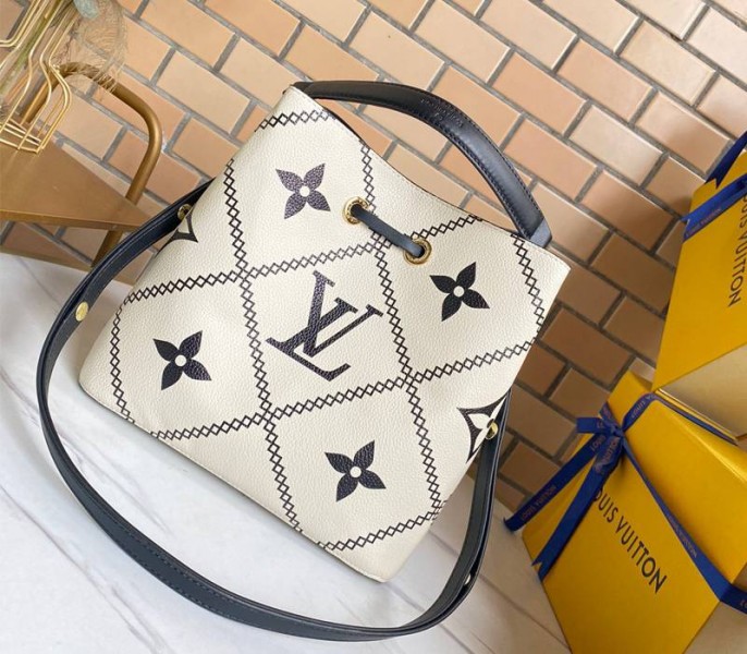 Louis Vuitton Spring 2022 Monogram Empreinte NeoNoe MM Bag In Cream - Louis Vuitton
