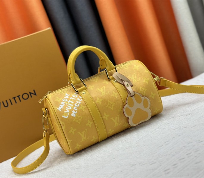 Louis Vuitton Monogram Heritage Canvas Keepall Bandouliere 25 In Yellow - Louis Vuitton