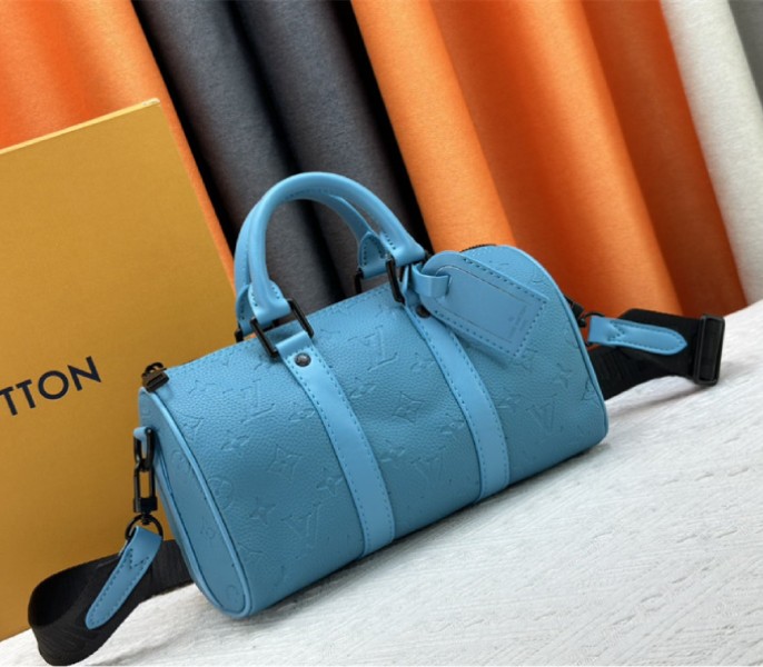 Louis Vuitton Taurillon Monogram Leather Keepall Bandouliere 25 In Turquoise - Louis Vuitton
