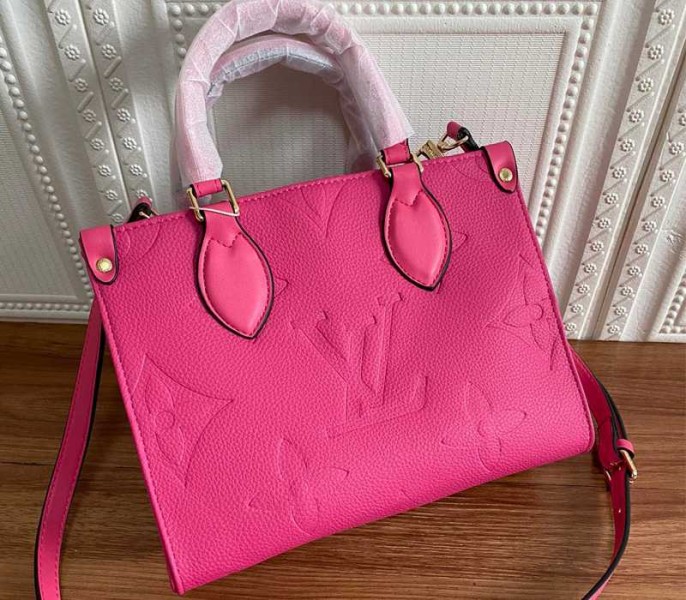 Louis Vuitton Monogram Empreinte Leather Onthego PM Bag In Freesia Pink - Louis Vuitton
