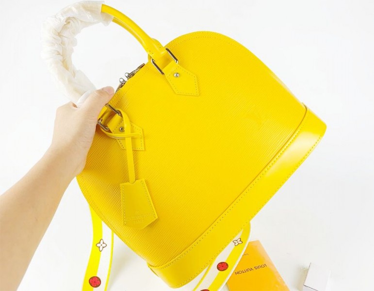 Louis Vuitton Epi Leather Alma PM Handbag In Cedrat Yellow With Jacquard Strap - Louis Vuitton