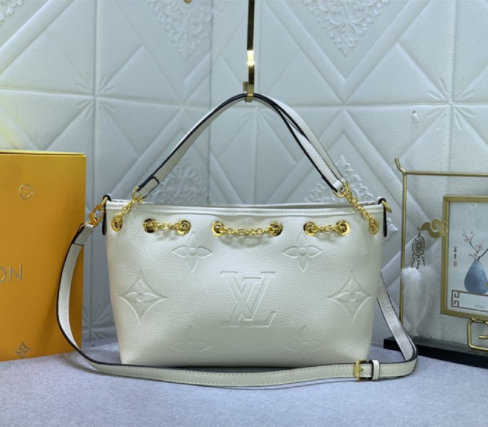 Louis Vuitton Monogram Empreinte Leather Bundle Bag In Cream - Louis Vuitton