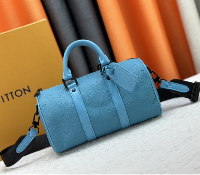 Louis Vuitton Taurillon Monogram Leather Keepall Bandouliere 25 In Turquoise - Louis Vuitton