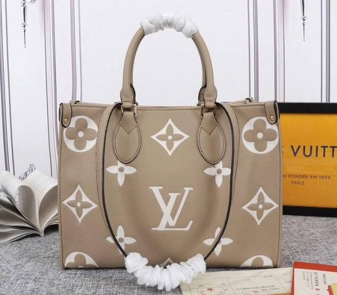 Louis Vuitton Monogram Empreinte OnTheGo MM Tote In Tourterelle Gray - Louis Vuitton