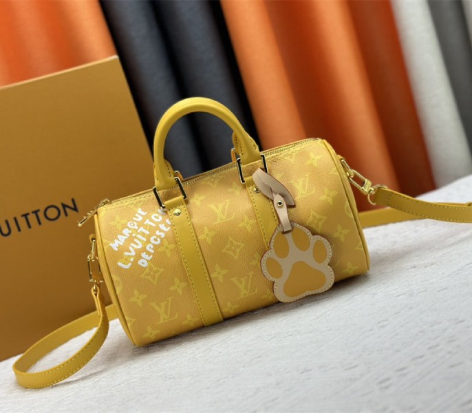 Louis Vuitton Monogram Heritage Canvas Keepall Bandouliere 25 In Yellow - Louis Vuitton