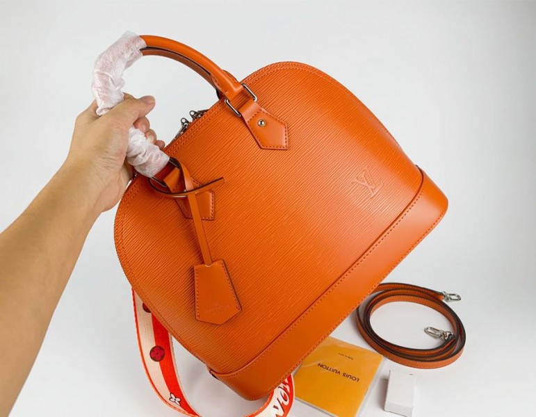 Louis Vuitton Epi Leather Alma PM Handbag In Orange With Jacquard Strap - Louis Vuitton