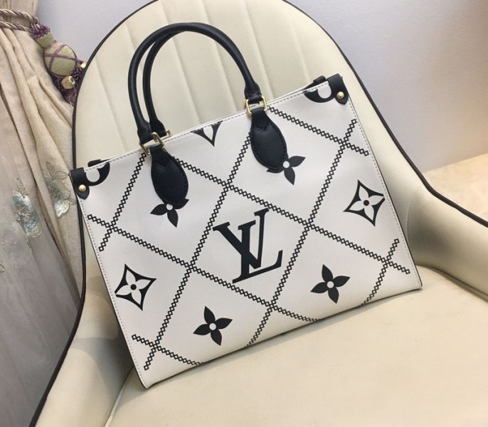 Louis Vuitton Spring 2022 Monogram Empreinte Onthego MM Tote In Cream - Louis Vuitton