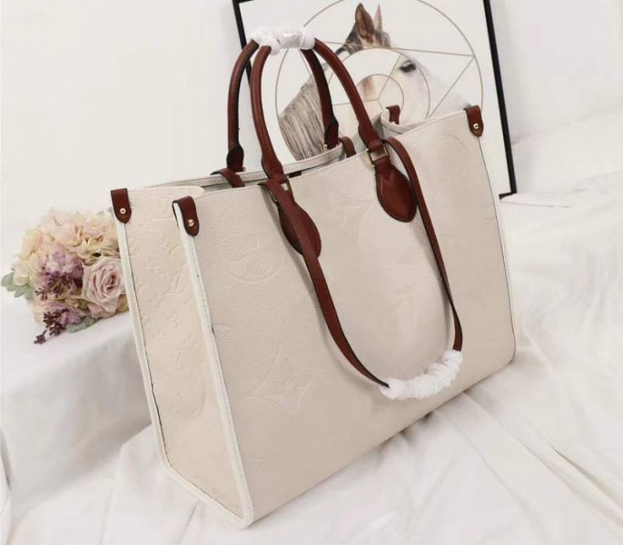 Louis Vuitton Monogram Empreinte Giant Onthego GM Tote In Cream - Brown - Louis Vuitton