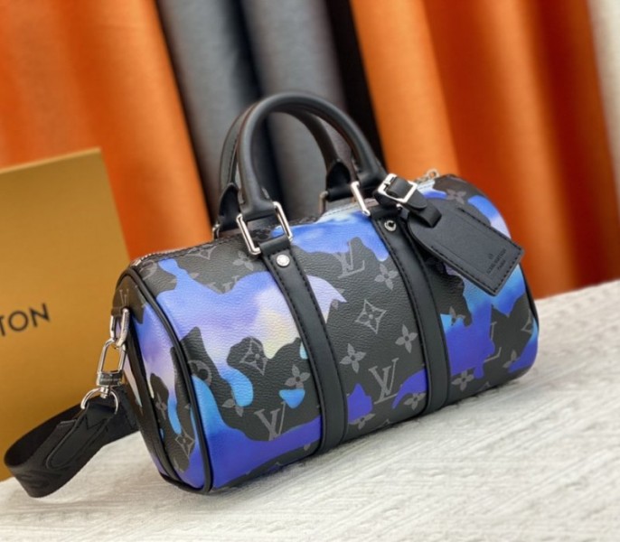 Louis Vuitton Monogram Eclipse Keepall Bandouliere 25 Travel Bag In Blue And Purple Sunrise - Louis Vuitton