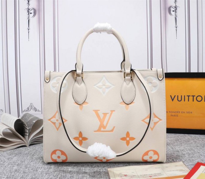 Louis Vuitton Monogram Empreinte Leather Onthego MM Bag In Cream Saffron - Louis Vuitton