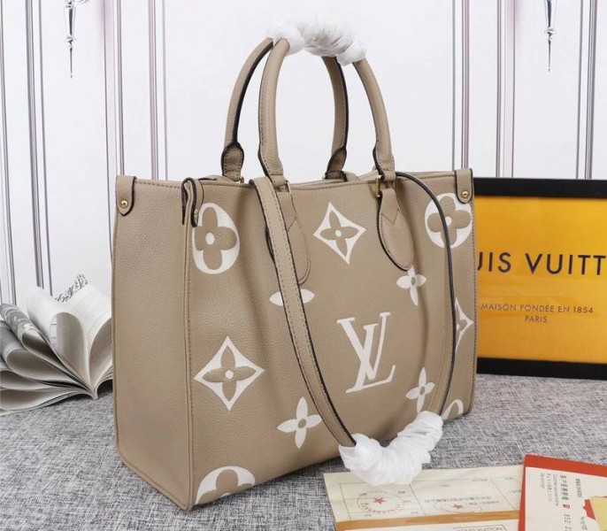 Louis Vuitton Monogram Empreinte OnTheGo MM Tote In Tourterelle Gray - Louis Vuitton