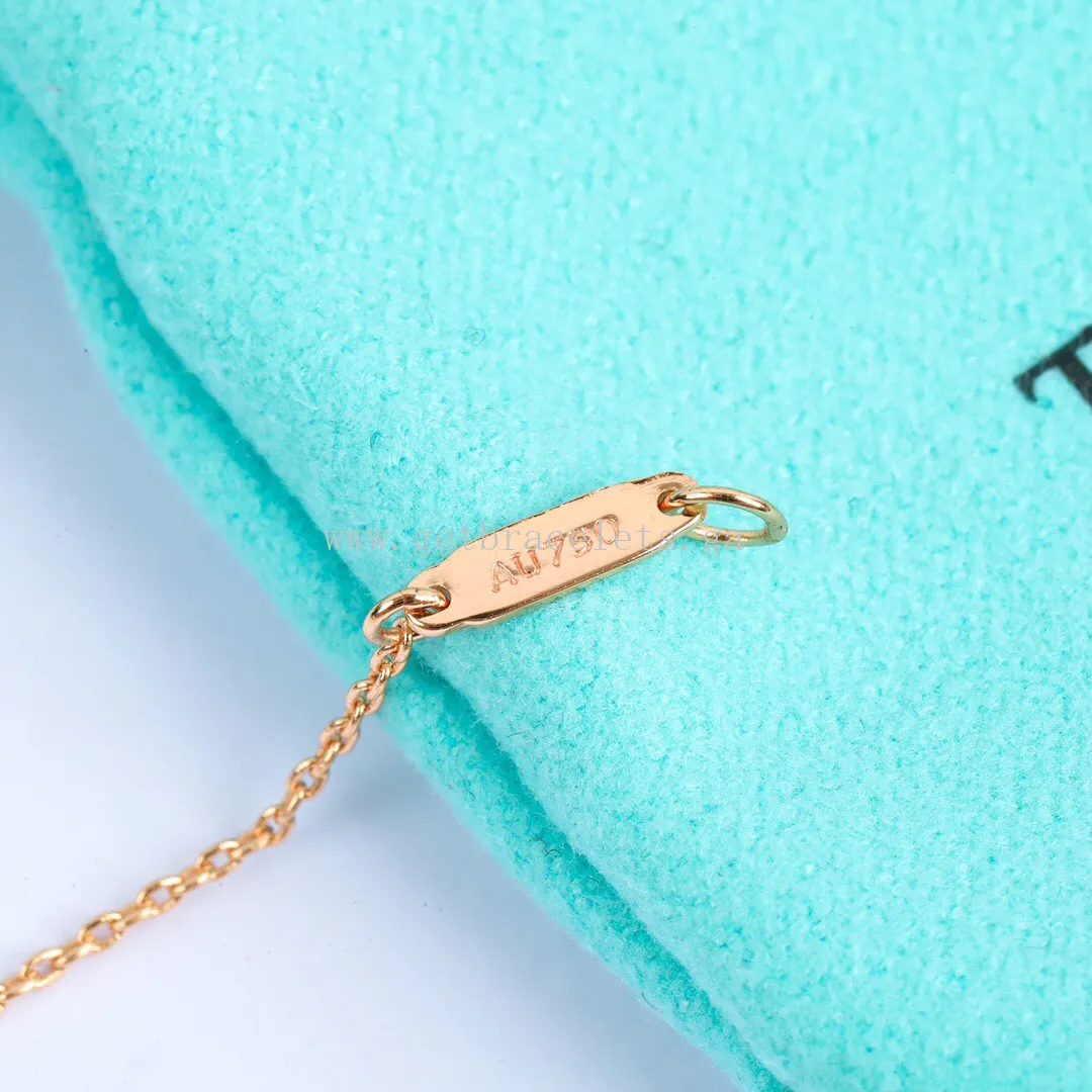 Tiffany Keys Crown Key in Rose Gold/White Gold with Diamonds