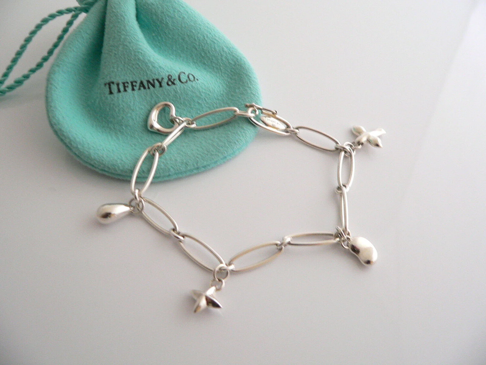 Tiffany & Co Silver Peretti Dove Heart Bean Star Charm Bracelet Gift Pouch Love