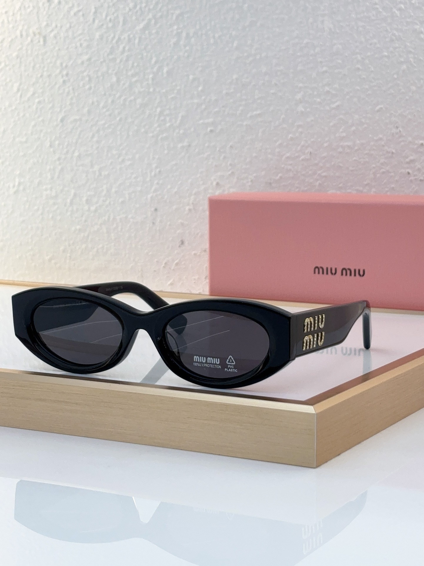 MiuMiu Sunglasses