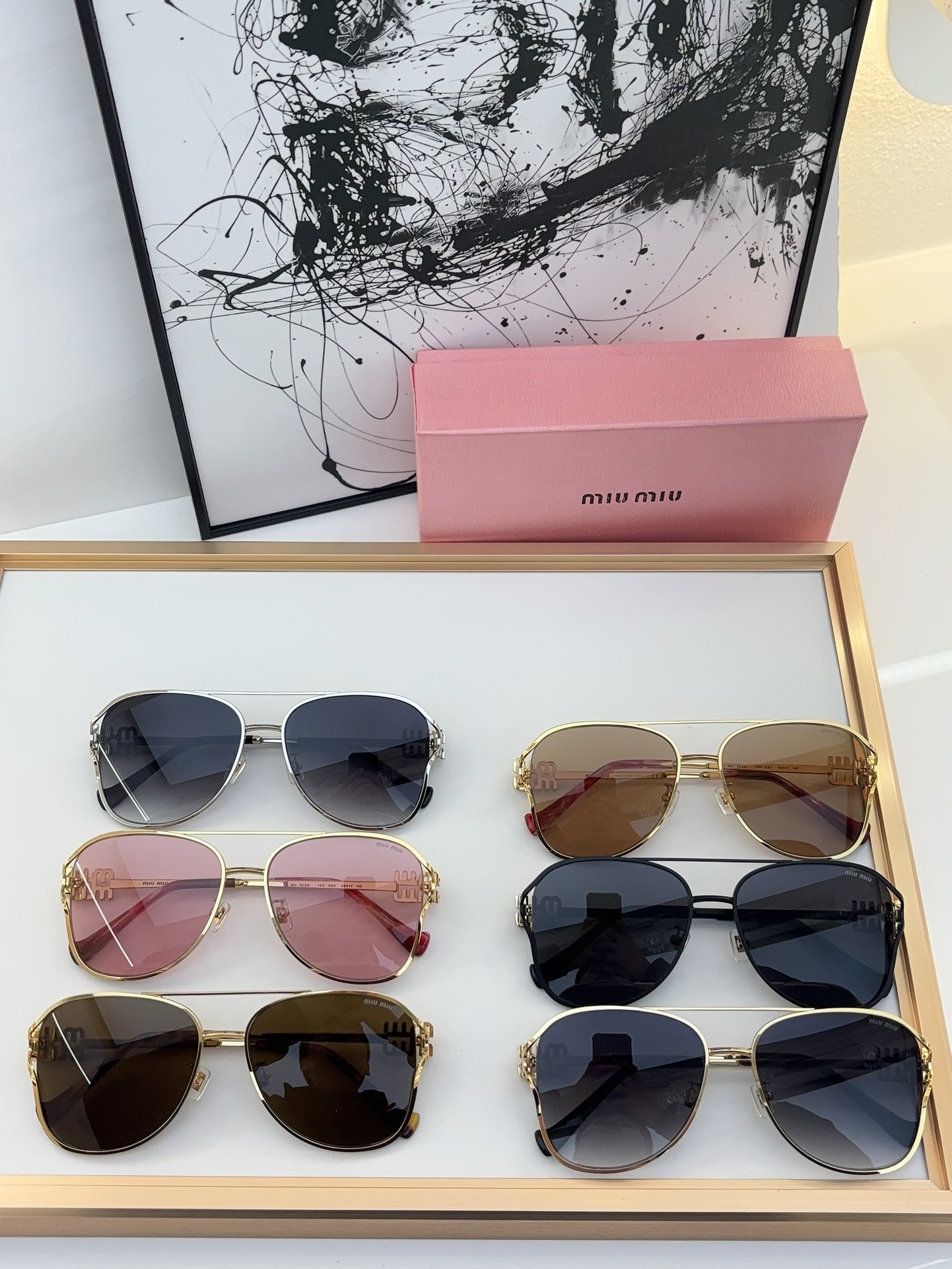 MiuMiu Sunglasses