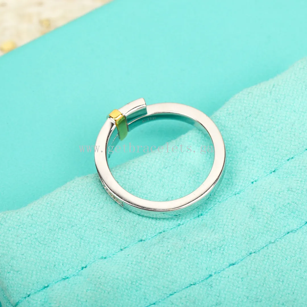 Tiffany Edge Bypass Ring in Platinum and Yellow Gold with Diamonds