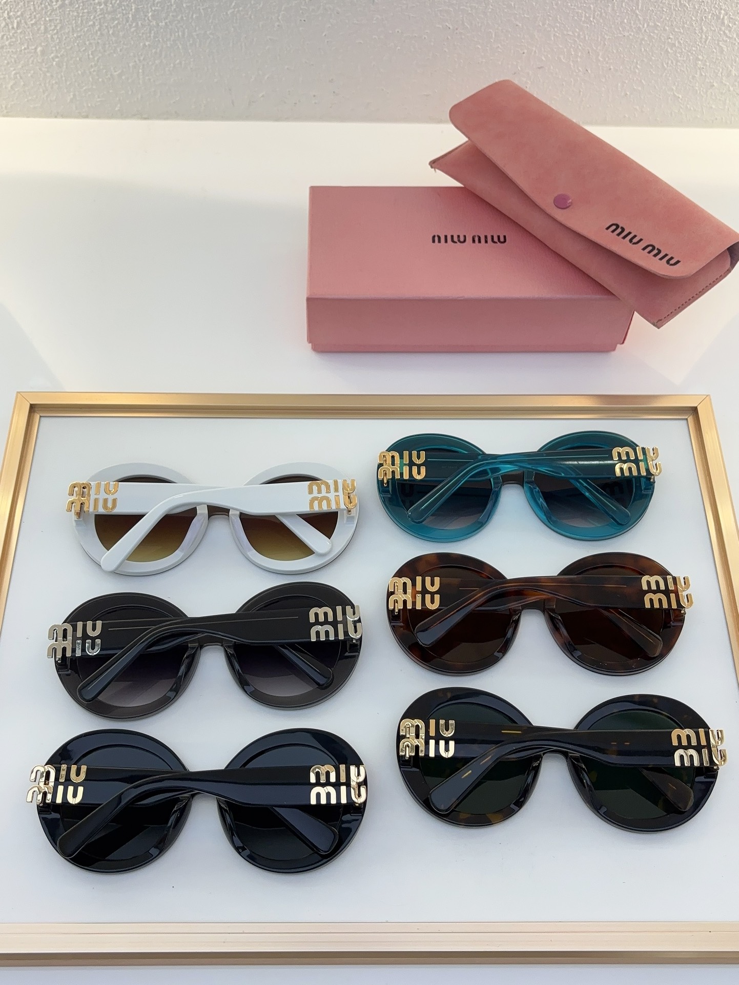 MiuMiu Sunglasses