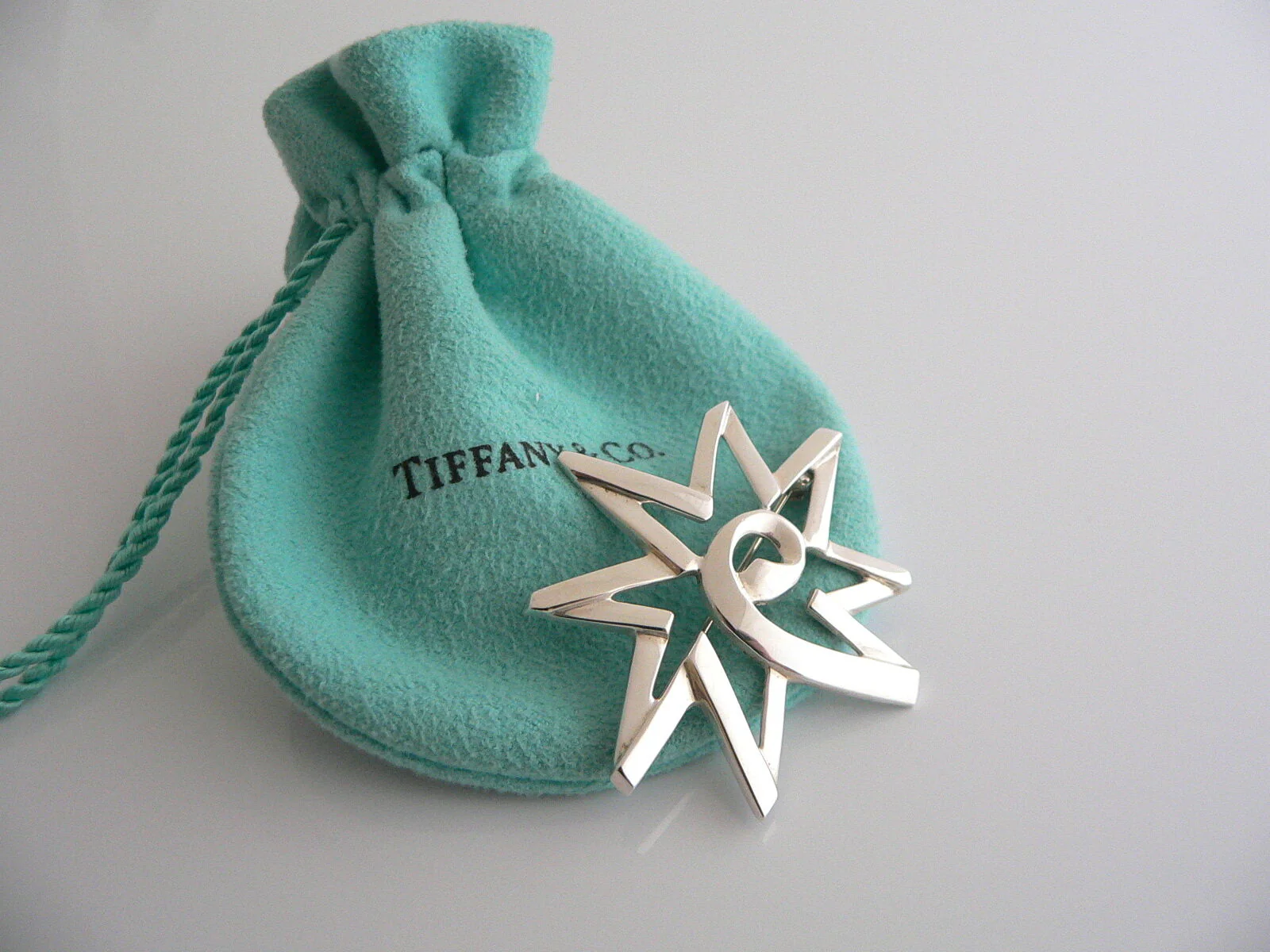 Tiffany & Co Silver Picasso Sun Star Pin Rare Gift Pouch Love Statement