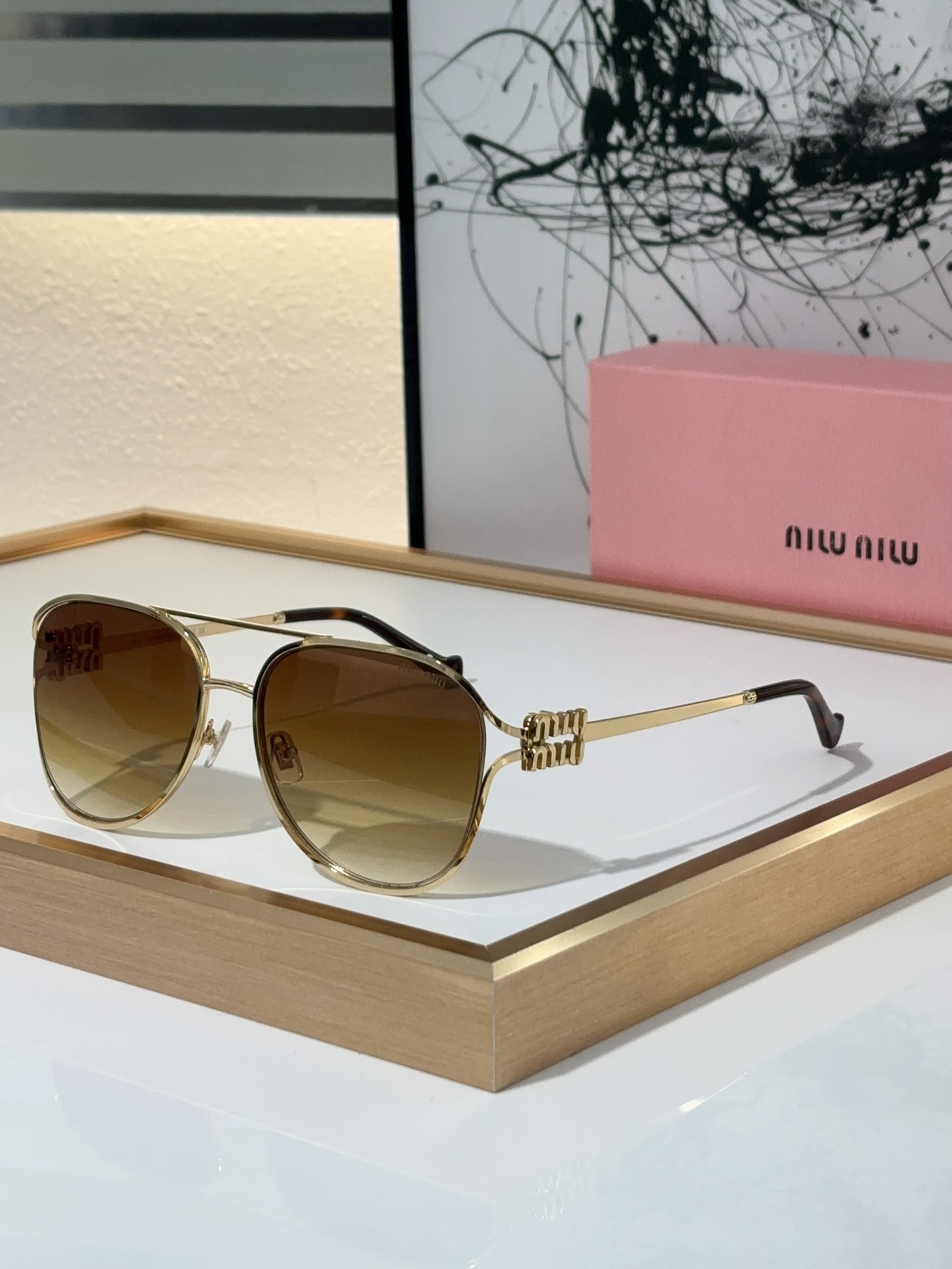 MiuMiu Sunglasses