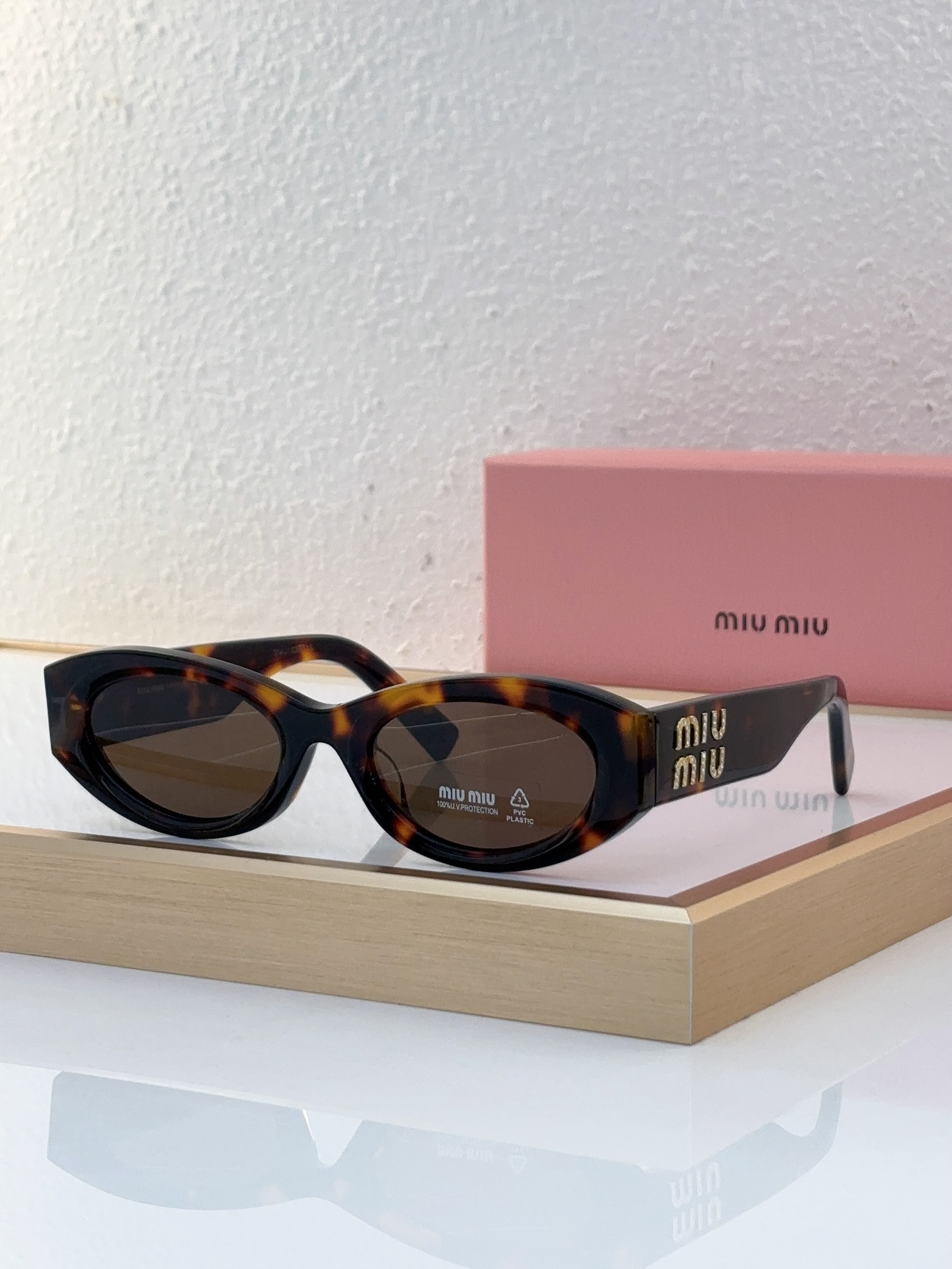 MiuMiu Sunglasses