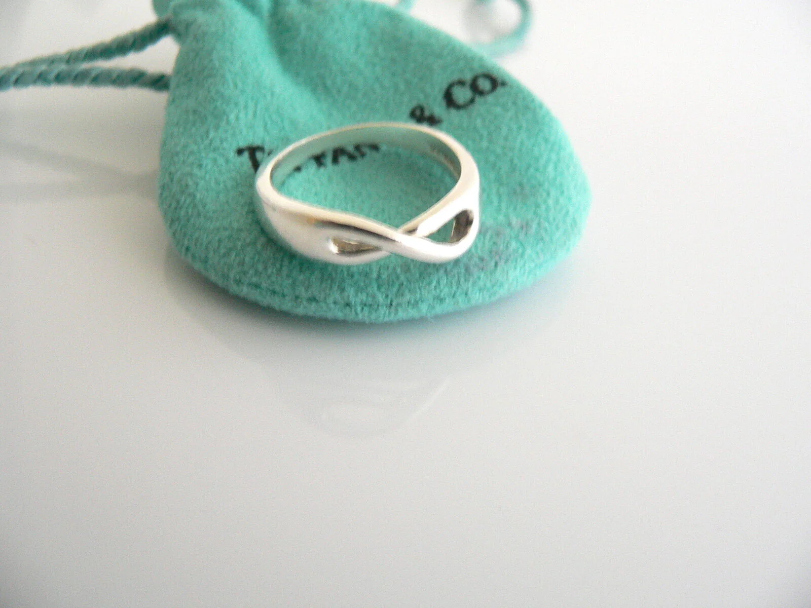 Tiffany & Co Silver Infinity Love Knot Ring Band Sz 5.5 Gift Pouch