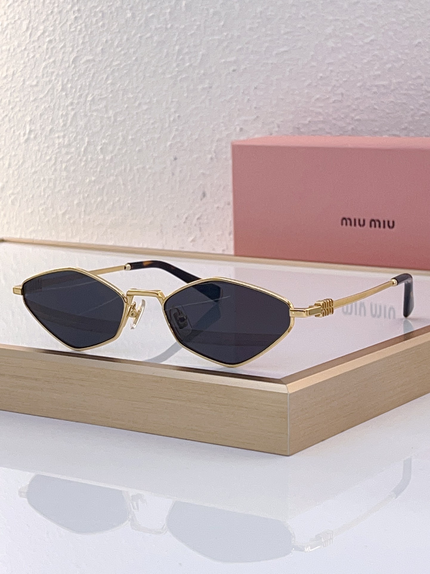 MiuMiu Sunglasses