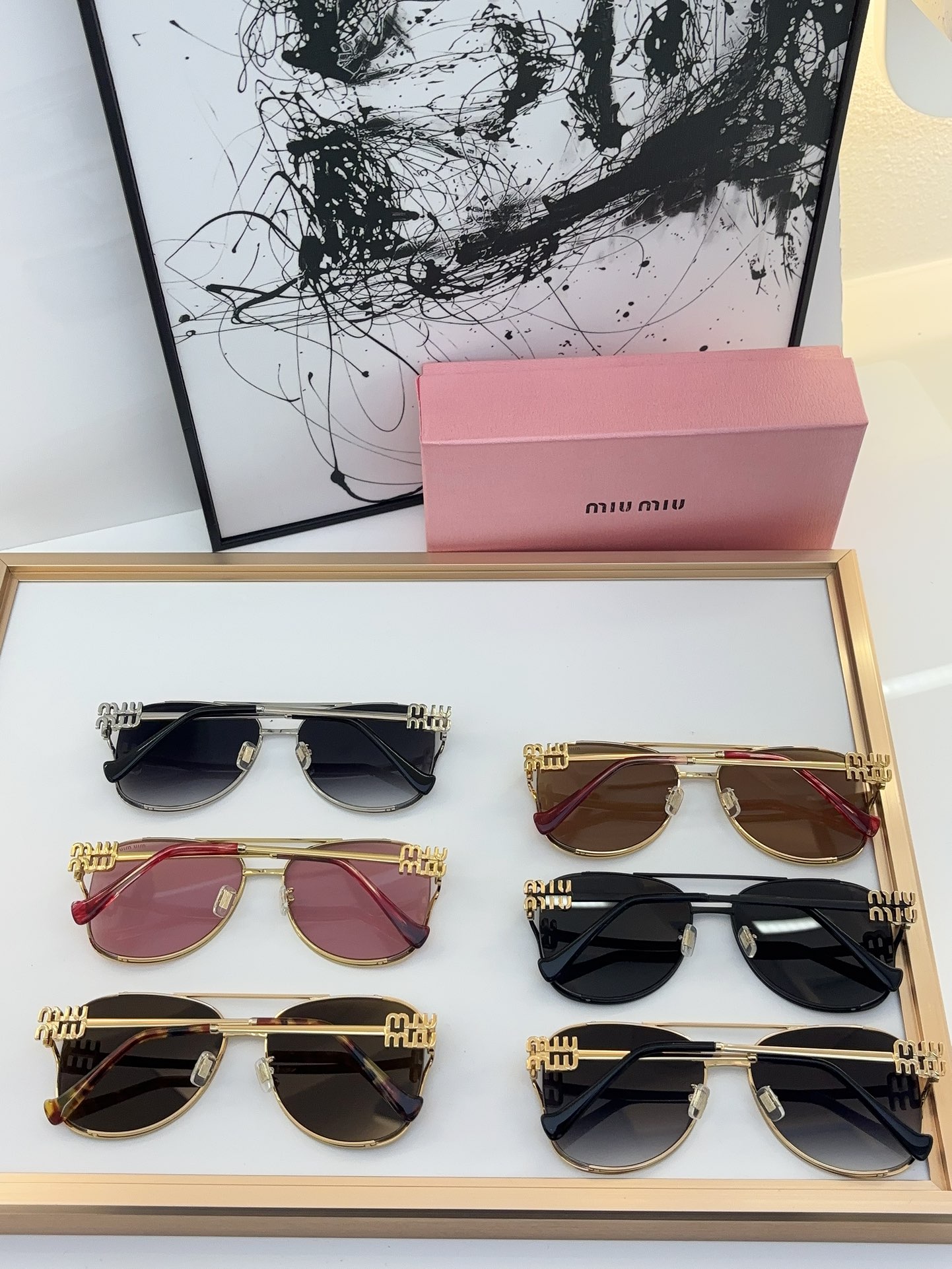 MiuMiu Sunglasses