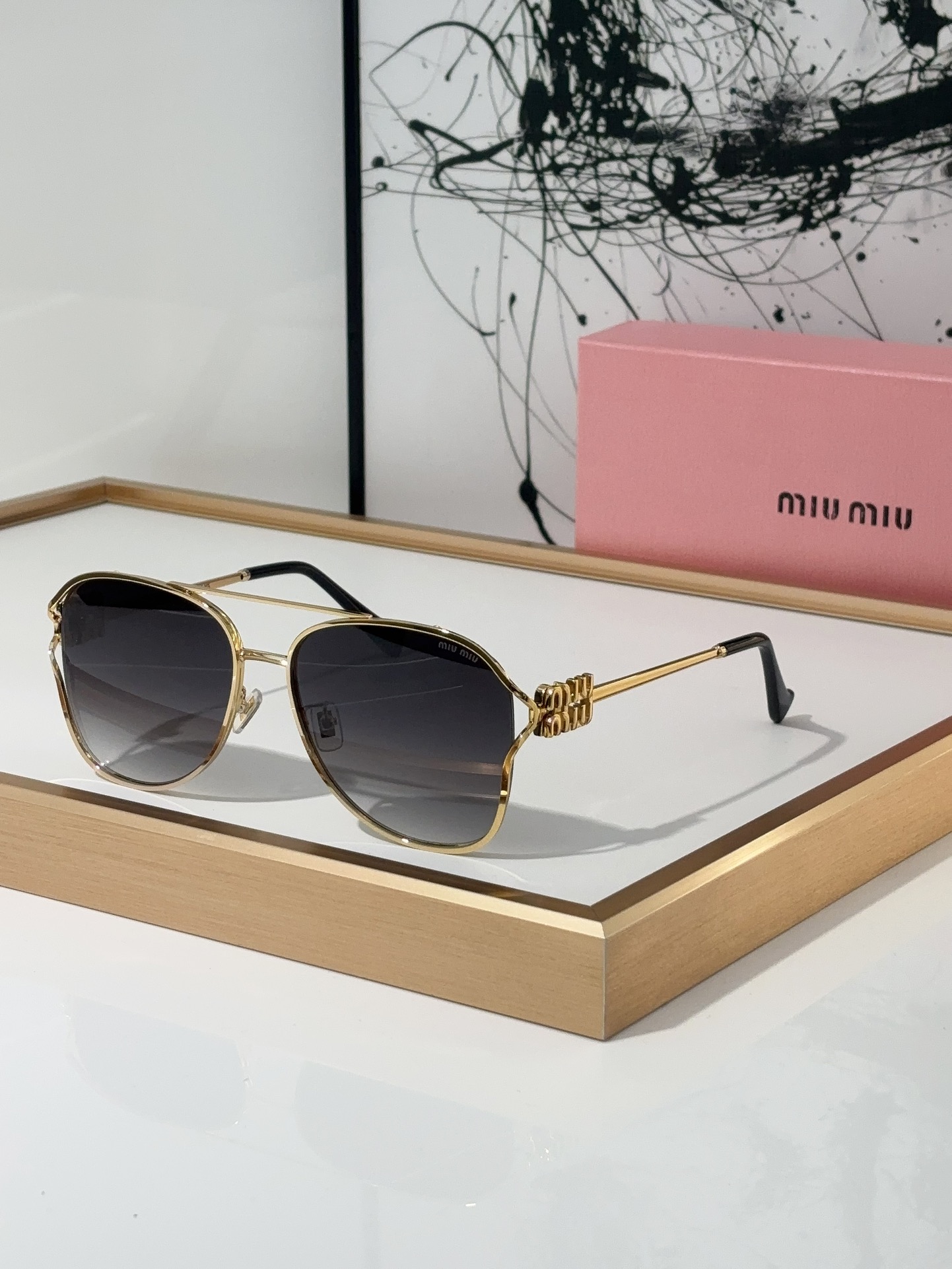 MiuMiu Sunglasses