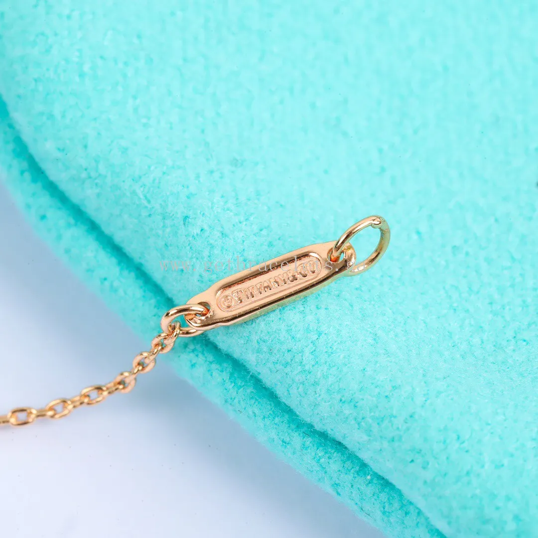 Tiffany Keys Crown Key in Rose Gold/White Gold with Diamonds