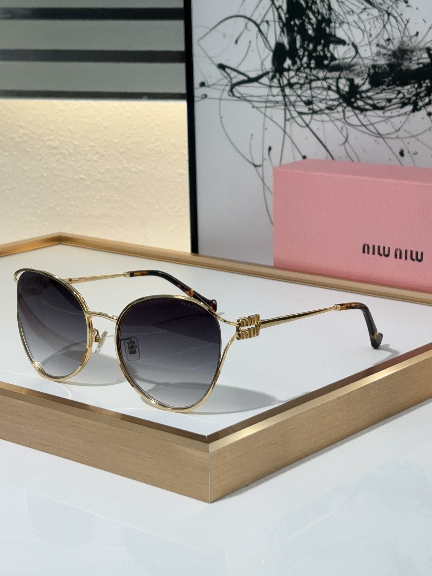 MiuMiu Sunglasses