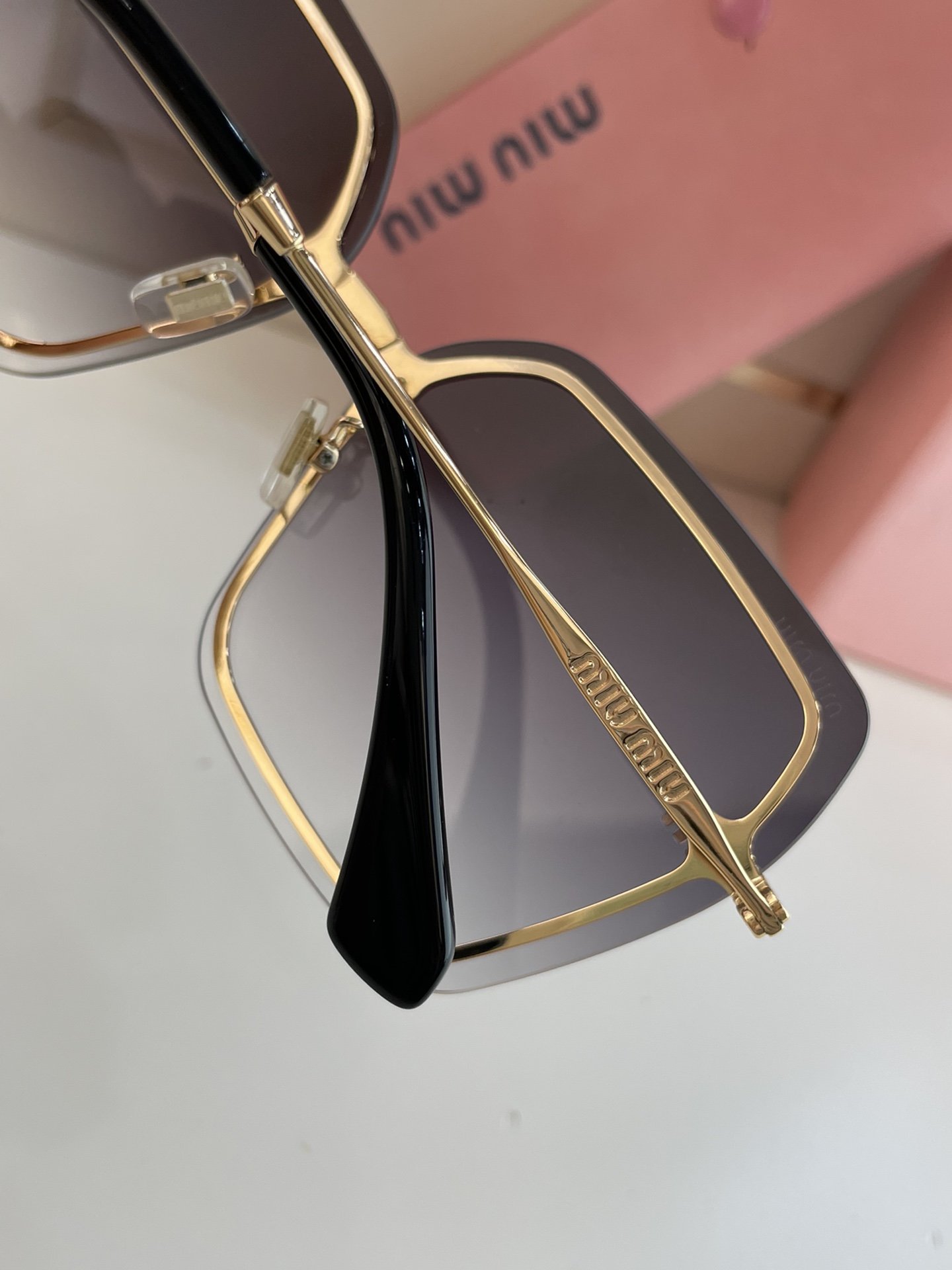 MiuMiu Sunglasses