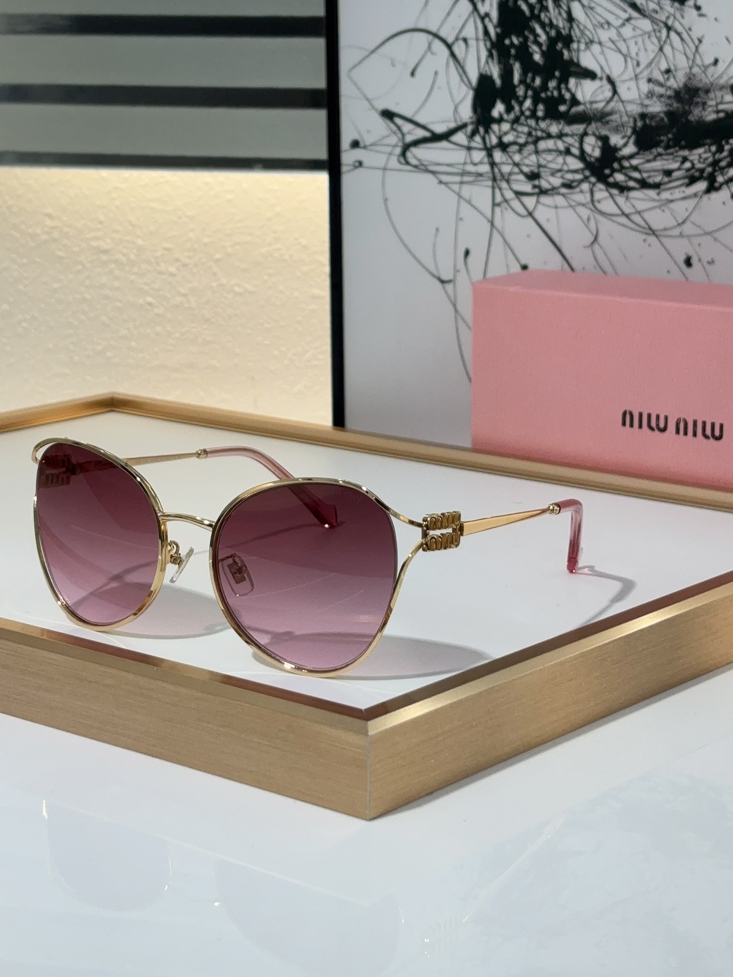 MiuMiu Sunglasses