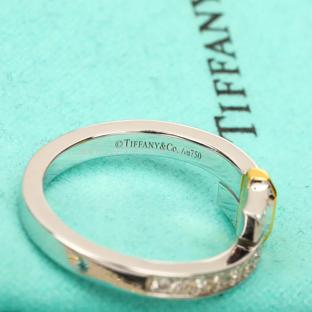 Tiffany Edge Bypass Ring in Platinum and Yellow Gold with Diamonds