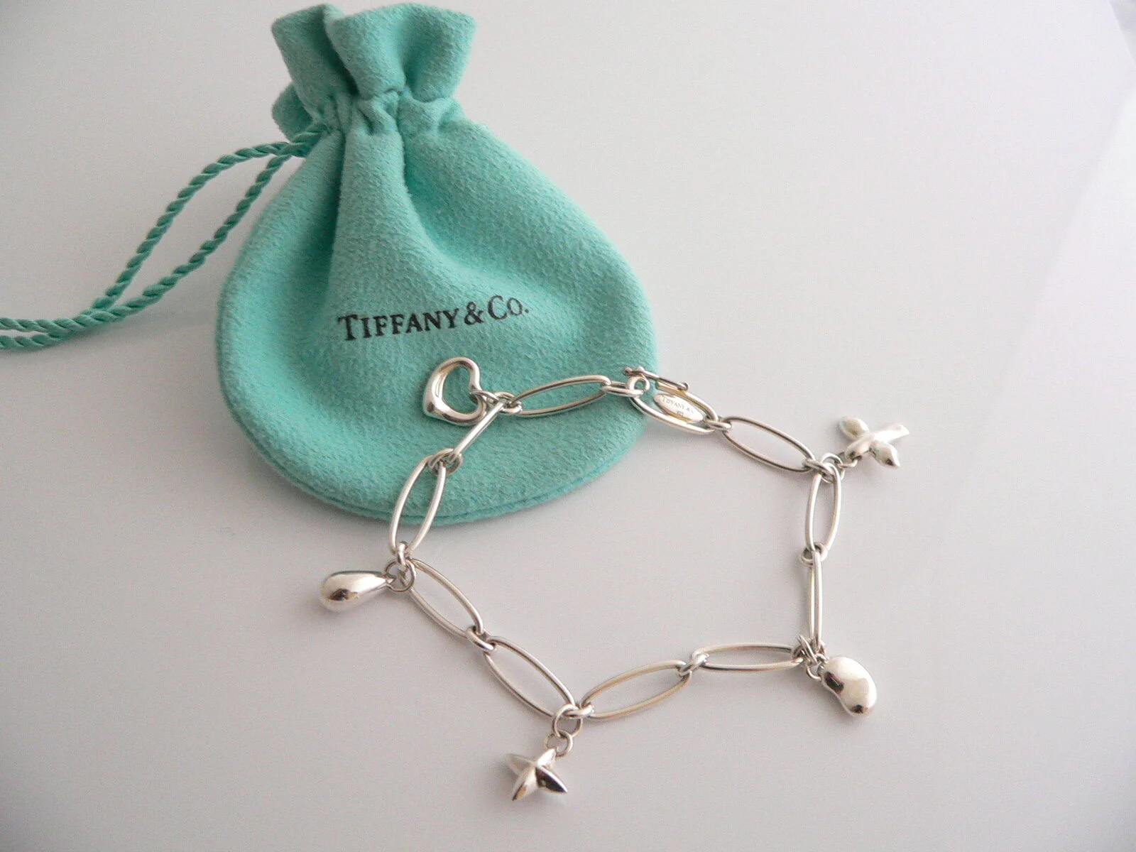 Tiffany & Co Silver Peretti Dove Heart Bean Star Charm Bracelet Gift Pouch Love