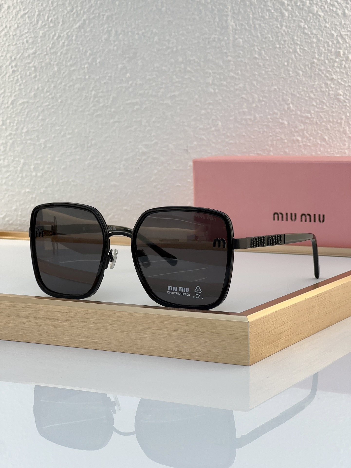 MiuMiu Sunglasses