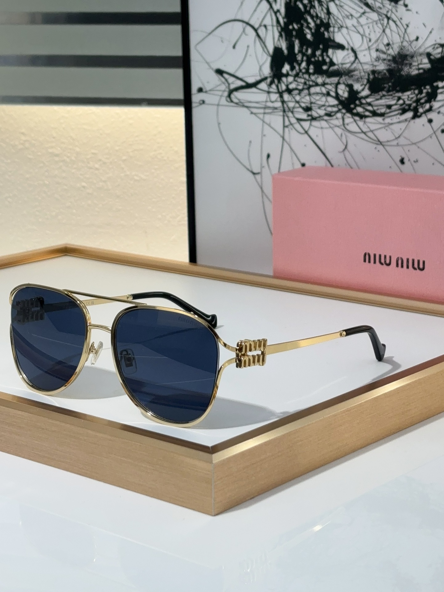 MiuMiu Sunglasses